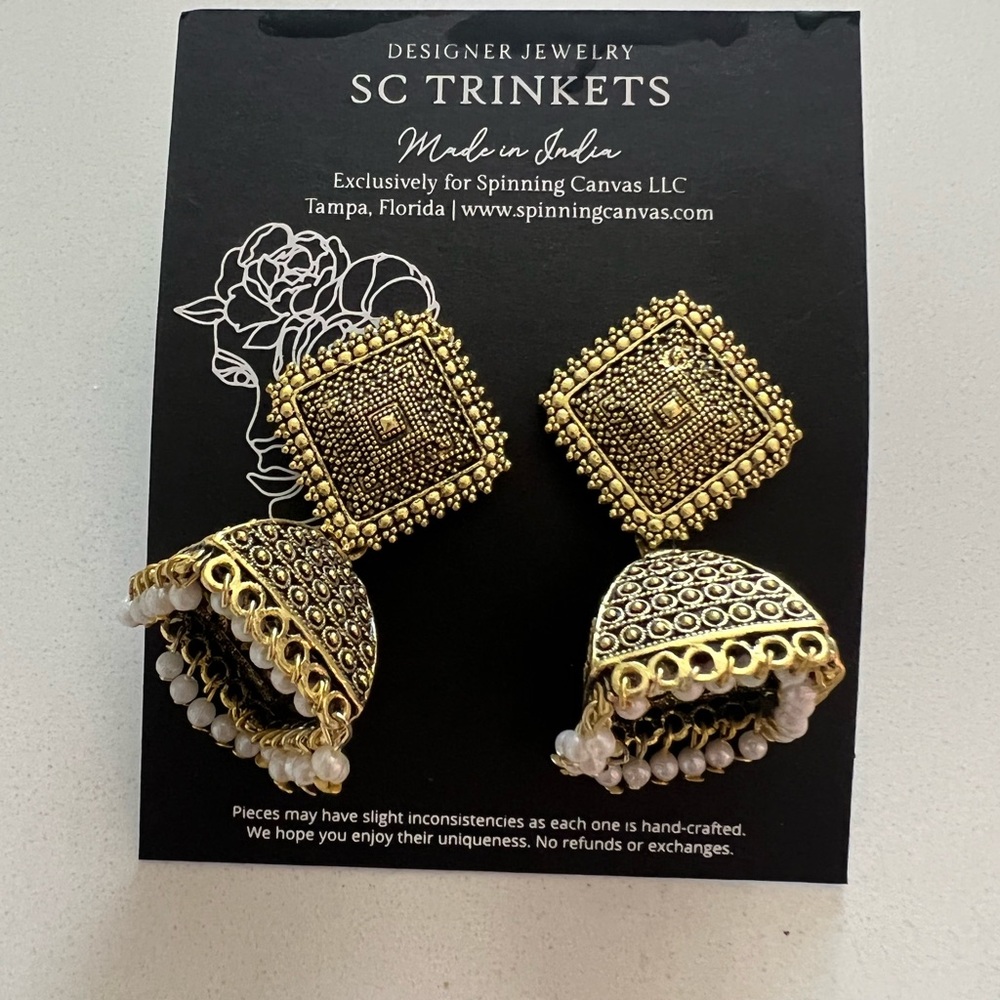 Ethnic gold earrings